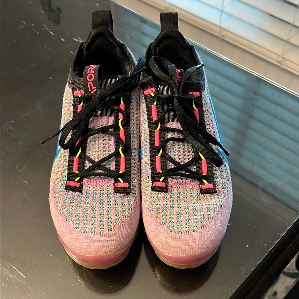 Nike Pink and Black Sneakers with Unique Lacing System and Knit Upper